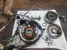 31120-hc4-750 Honda 88 Trx 300 Fourtrax Stator With Cover And Flywheel One Way Starter Gear