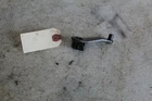 Oem 87-02 Suzuki Quadrunner 250 Gear Shifting Cable Arm # 25630-19B70 Used. Price: $25.00.