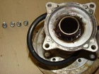 1986 Suzuki LT230GE Shaft Rear Axle Bearing Carrier Housing Assy (64720-18A00) Used. Price: $125.00.