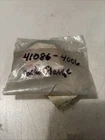 Nos Kawasaki Axle Flange #41086-4006 New. Price: $6.00.