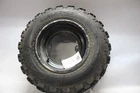 5LP-25180-10-00 Front Right Rim Tire AT21X7-10 2002 Yamaha Raptor 660 Used. Price: $100.00.