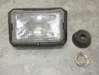 1985 Honda Headlight With Trim Ring Assembly 33100-965-003 Used. Price: $70.00.