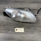 2005 Suzuki King Quad Lt-a 700X Right Headlight 35100-31G60-999 Used. Price: $49.30.