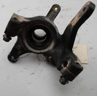 2003 Suzuki Eiger 400 Front Left Steering Knuckle Used. Price: $28.00.