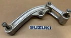 06-09 Suzuki Rear Shock Linkage Dog Bone Used. Price: $110.00.