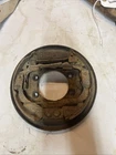 1996 Suzuki Quadrunner 250 Left Front Brake Drum Backing Plate 54810-19B20 A33 Used. Price: $35.00.