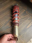 1987 Honda Fourtrax TRX250X #2 Front Right Shock 51400-HC0-004 Used. Price: $15.00.