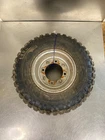 2003 Polaris Scrambler 50 Wheel Rim & Tire Assembly Used. Price: $58.00.