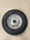 1984 Honda TRX200 Front Wheel (44701-VM5-000) & Tire (wanda 21X7.00X10) Used. Price: $50.00.