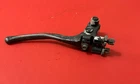 Suzuki Quadrunner LT160 Oem Front Brake Hand Lever Assembley Used. Price: $20.00.