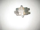 1986 Yamaha MOTO-4 YFM225 Front Brake Link Housing Block Used. Price: $7.77.