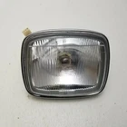 1986 Suzuki LT250 Headlight Oem Nos 35100-24500 New. Price: $39.99.