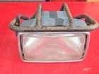1987 Suzuki LT230E Quadrunner Headlight Assembly With Bucket 35100-18A11 Guard Used. Price: $95.00.