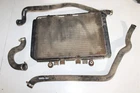 1997 Kawasaki Prairie 400 4X4 Radiator W/ Coolant Hoses Used. Price: $129.99.
