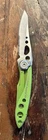 Leatherman Skeletool Kbx Multitool, Stainless Steel Lime Green 1/2 Serrated Edge Used. Price: $22.95.